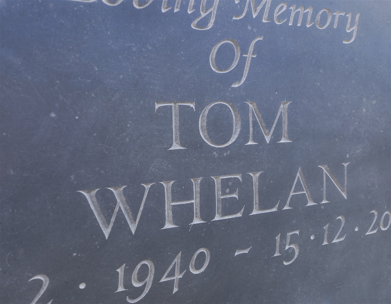 Detail of the hand carved lettering on a grave marker by James McLoughlin.