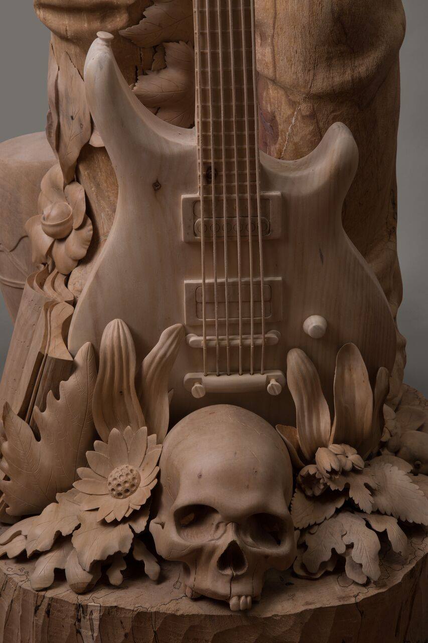 Wood sculpture with musical theme handcrafted by Irish sculptor James McLoughlin