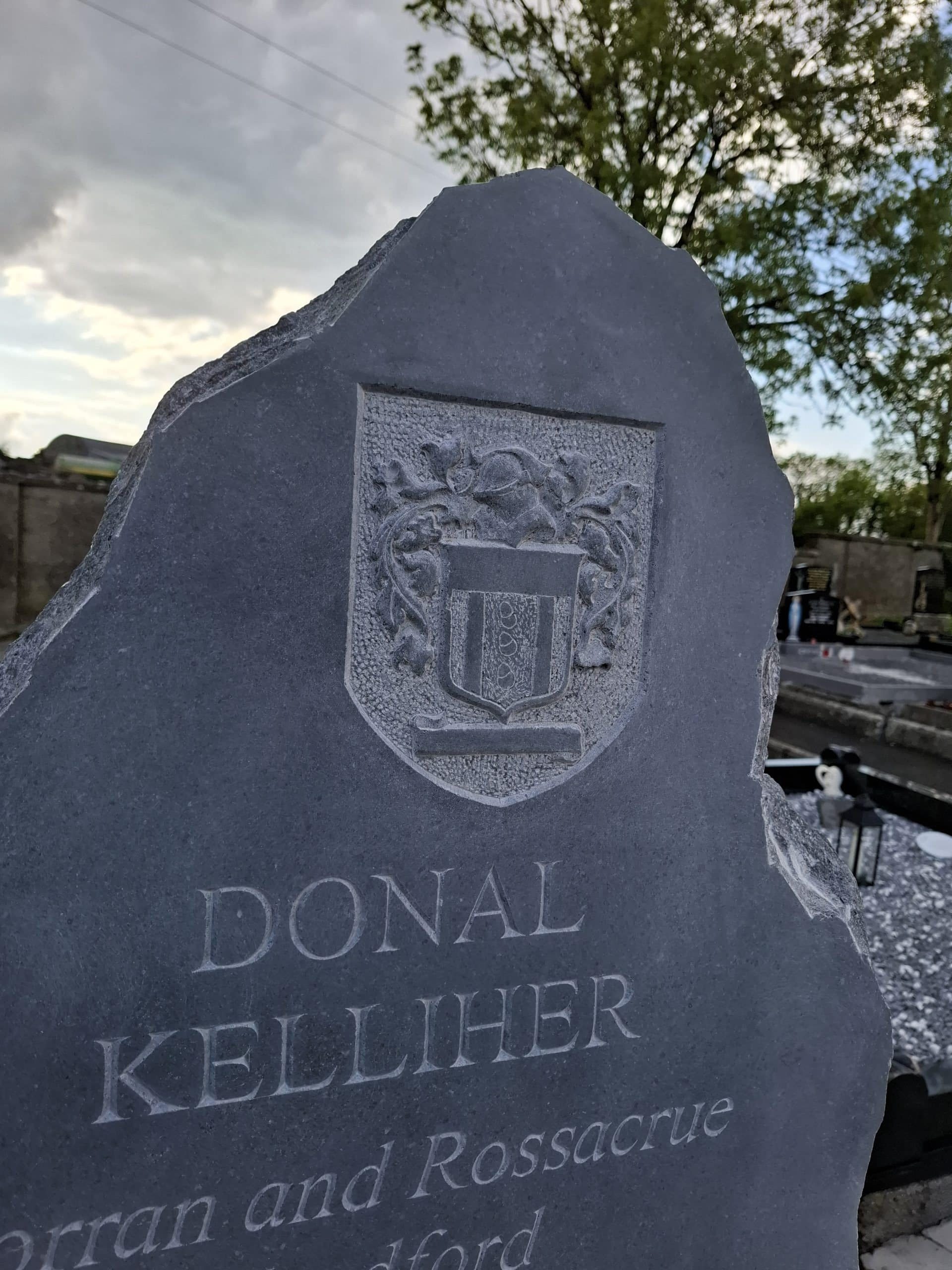 Image depicts the hand carved detail that can be achieved on a slate headstone.