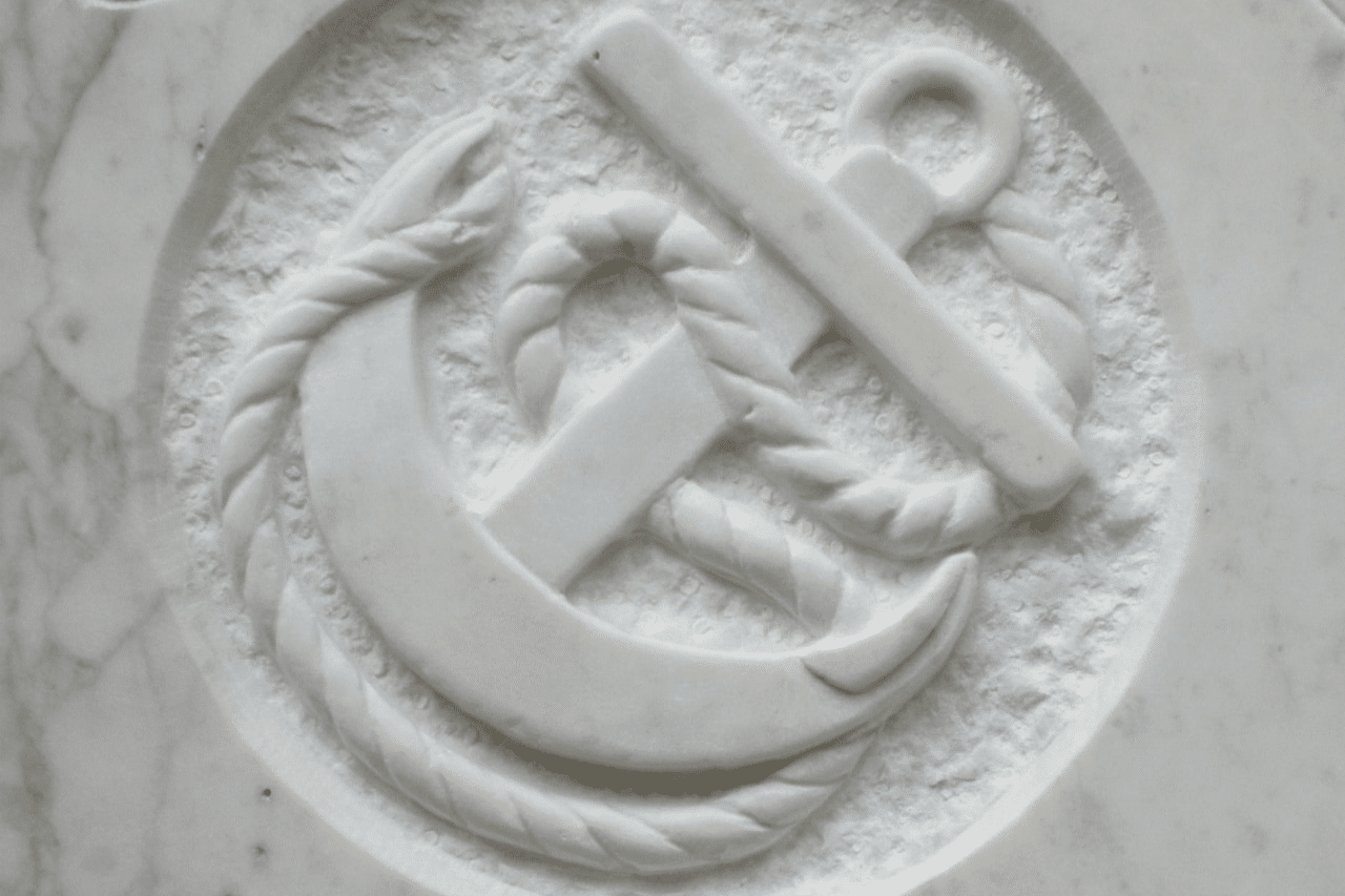 Limestone headstone with an intricately carved anchor design by Irish sculptor James McLoughlin.