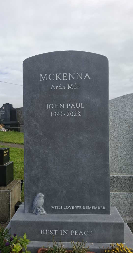 A hand carved headstone by James McLoughlin.